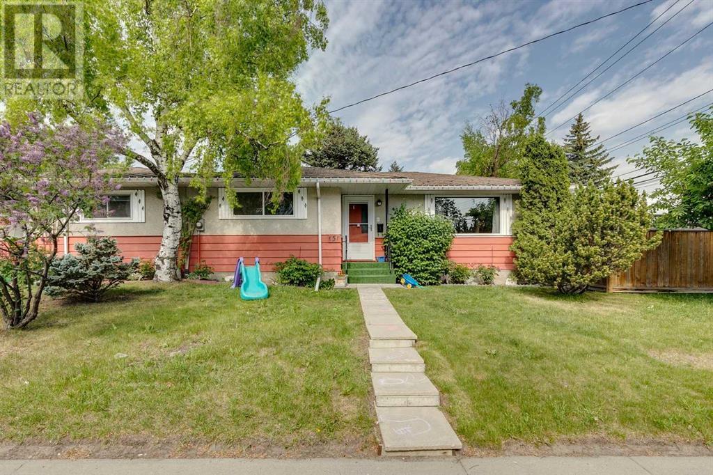 Multi-family House Bungalow for Sale in  &  Lissington Drive SW North Glenmore Park Calgary 