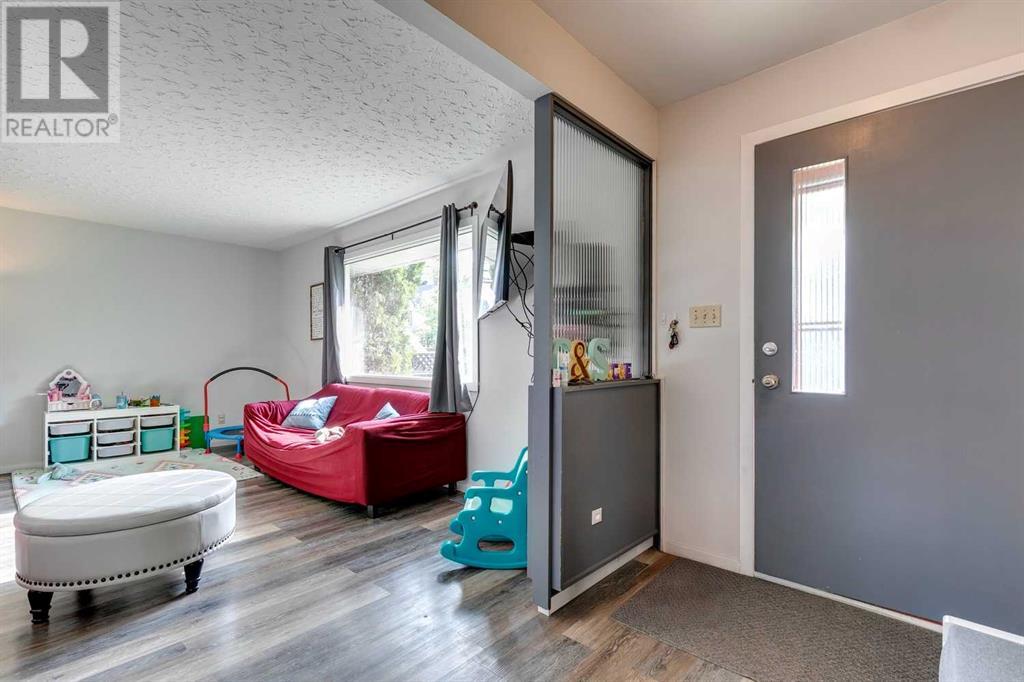 Multi-family House Bungalow for Sale in  &  Lissington Drive SW North Glenmore Park Calgary 