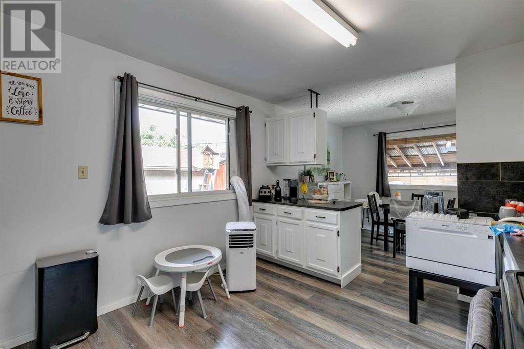Multi-family House Bungalow for Sale in  &  Lissington Drive SW North Glenmore Park Calgary 
