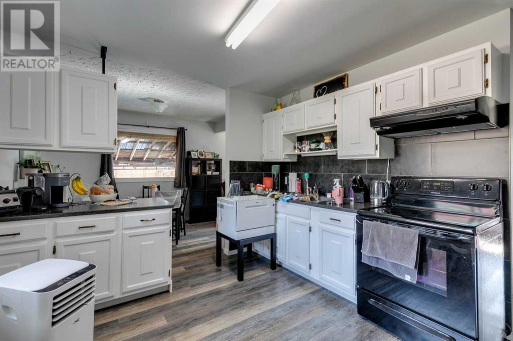 Multi-family House Bungalow for Sale in  &  Lissington Drive SW North Glenmore Park Calgary 