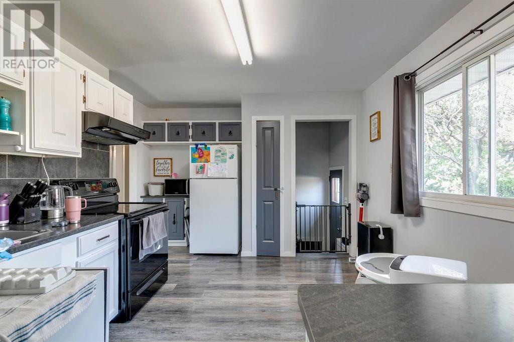 Multi-family House Bungalow for Sale in  &  Lissington Drive SW North Glenmore Park Calgary 