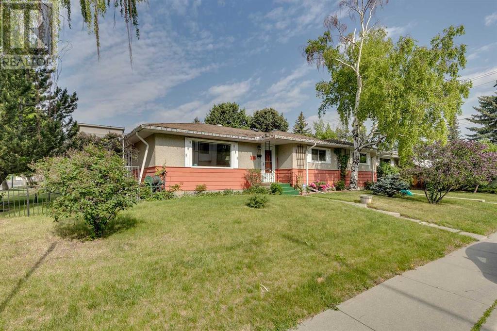 Multi-family House Bungalow for Sale in  &  Lissington Drive SW North Glenmore Park Calgary 