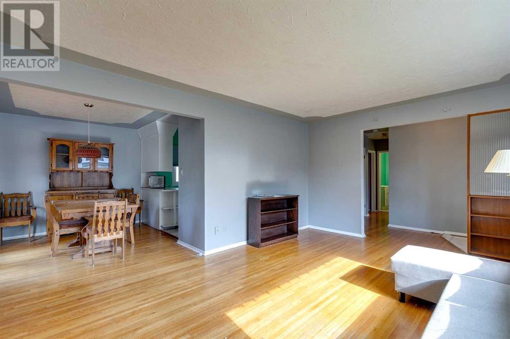 Multi-family House Bungalow for Sale in  &  Lissington Drive SW North Glenmore Park Calgary 