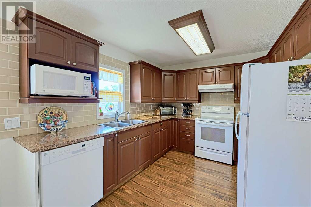 Single Family House Bi-level for Sale in    Avenue NW Bowness Calgary 