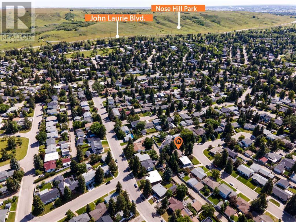 Single Family House 4 Level for Sale in  Brockington Road NW Brentwood Calgary 
