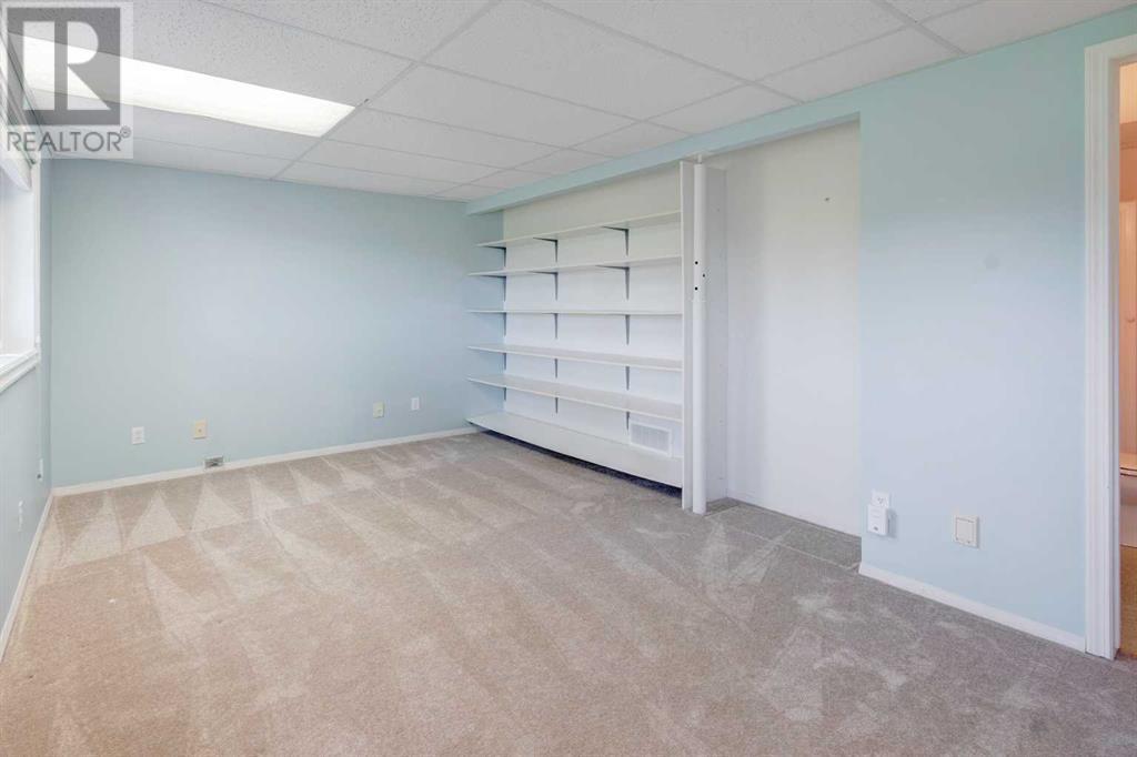 Single Family House for Sale in  Macewan Ridge Villas NW MacEwan Glen Calgary 