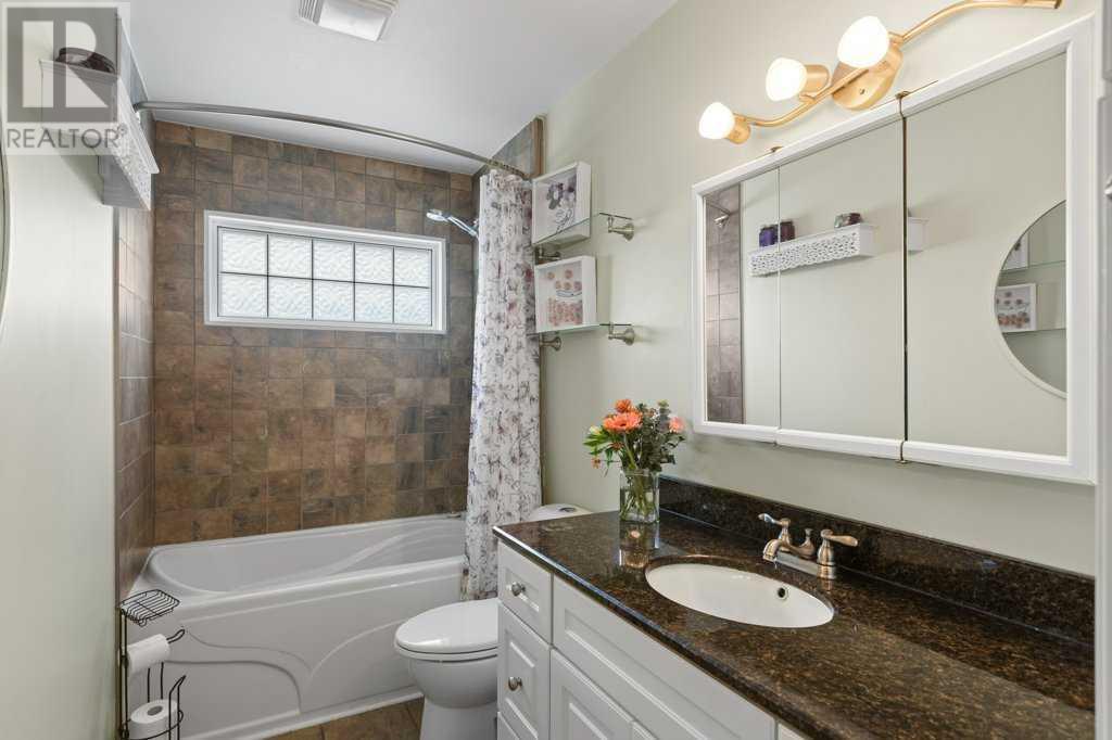 Single Family House Bi-level for Sale in  Allan Crescent SE Acadia Calgary 