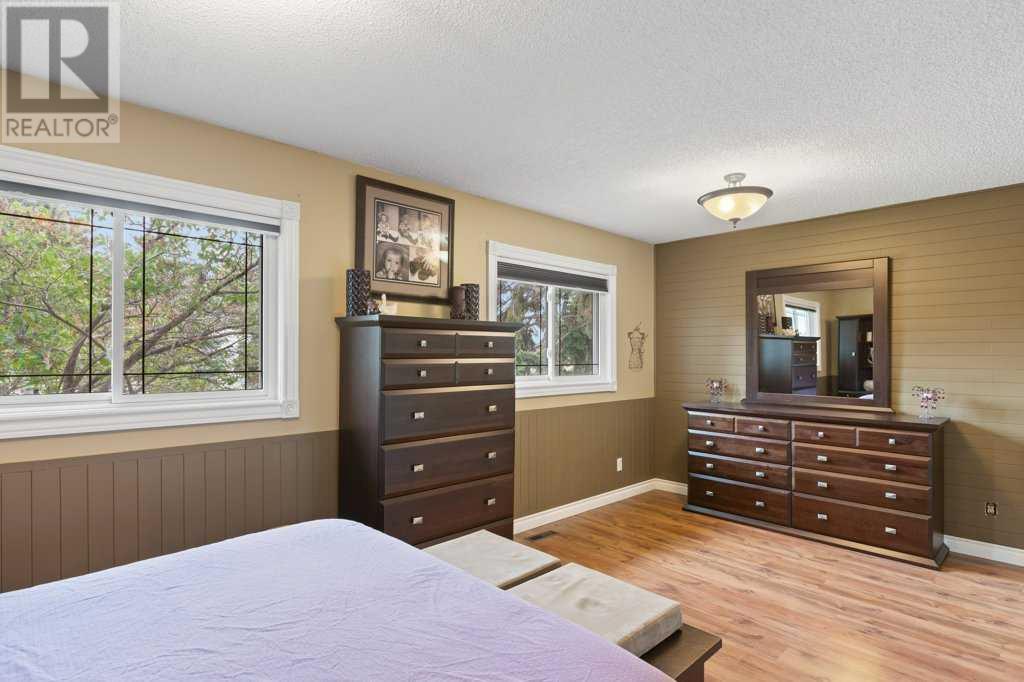 Single Family House Bi-level for Sale in  Allan Crescent SE Acadia Calgary 