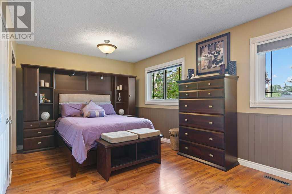 Single Family House Bi-level for Sale in  Allan Crescent SE Acadia Calgary 