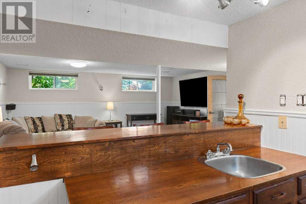 Single Family House Bi-level for Sale in  Allan Crescent SE Acadia Calgary 