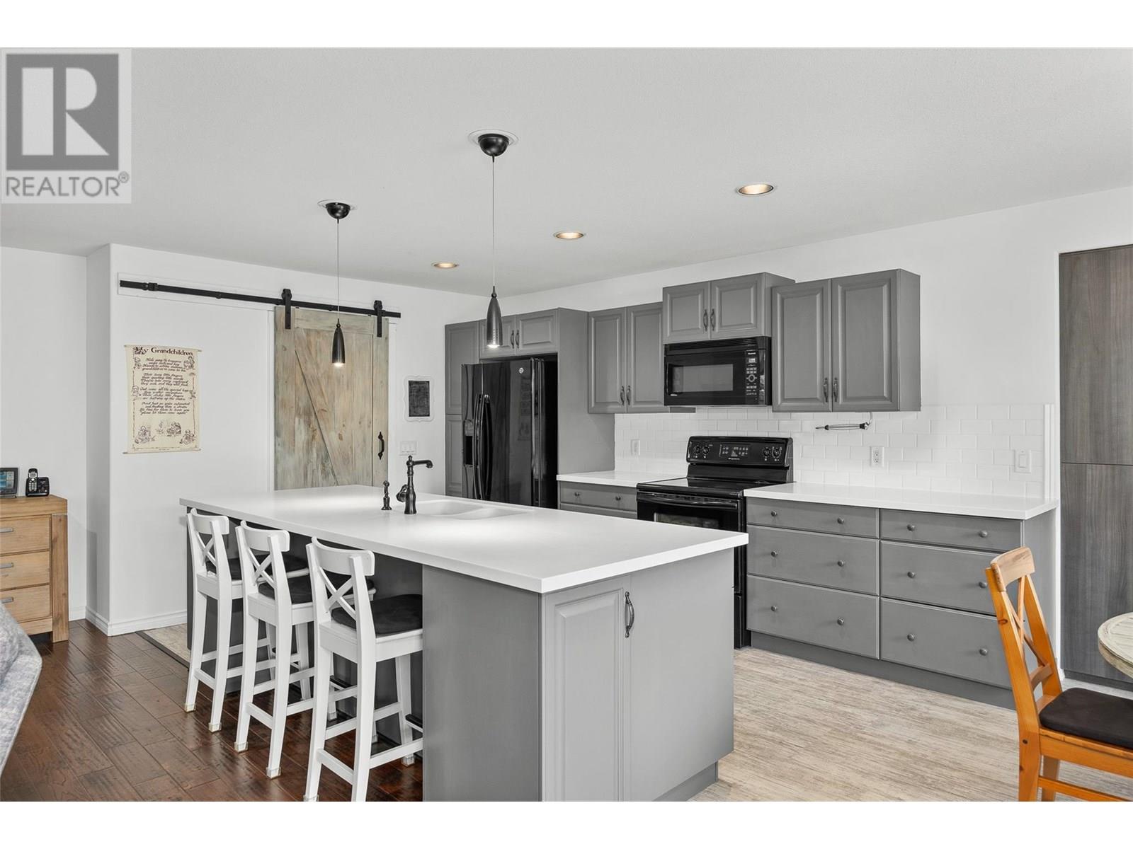 Photo 9 of 1503 Tanemura Crescent, Kelowna BC