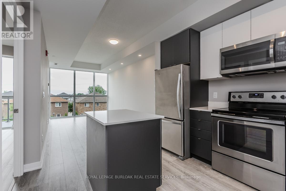 Photo 10 of C 320 5260 Dundas Street, Burlington ON