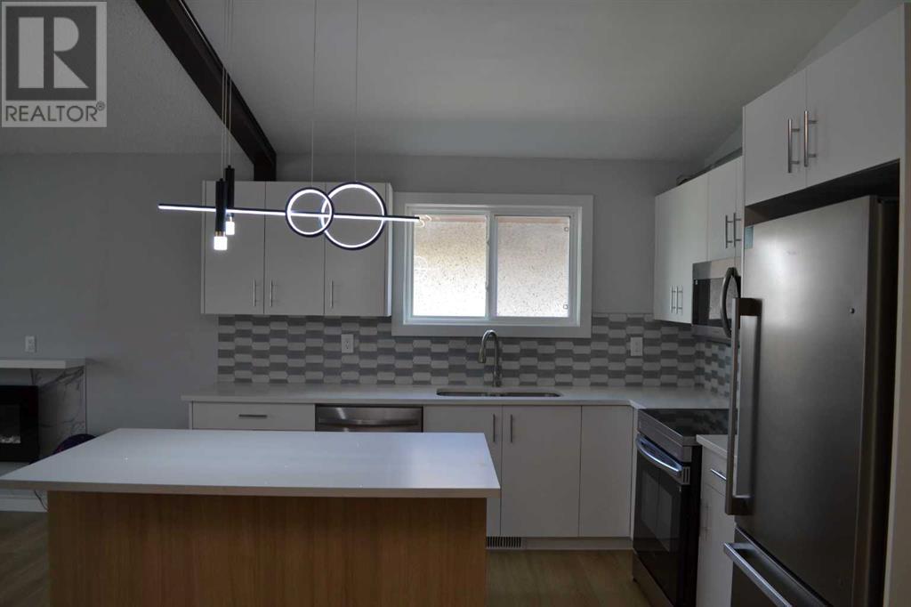 Single Family House 4 Level for Sale in  Tregullas Street NW Thorncliffe Calgary 