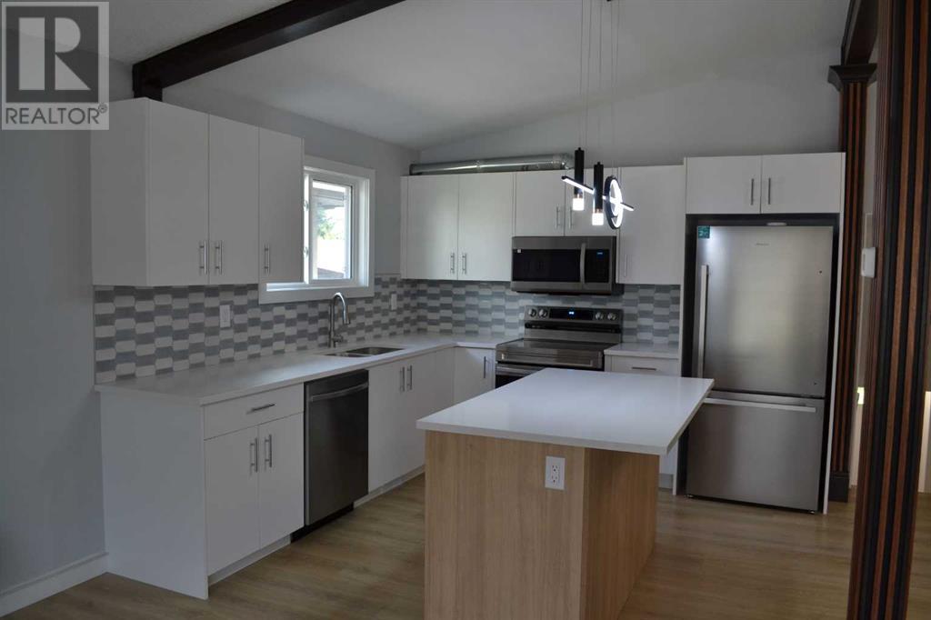 Single Family House 4 Level for Sale in  Tregullas Street NW Thorncliffe Calgary 