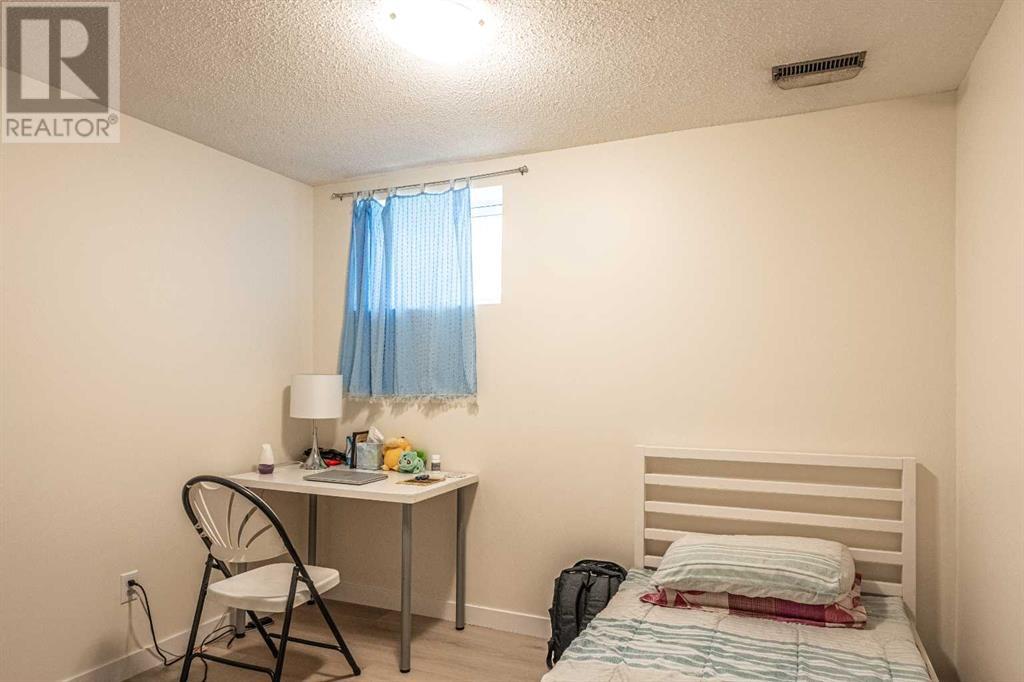Multi-family House Bi-level for Sale in  Tavender Road NW Thorncliffe Calgary 