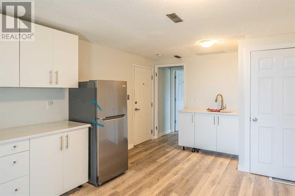 Multi-family House Bi-level for Sale in  Tavender Road NW Thorncliffe Calgary 