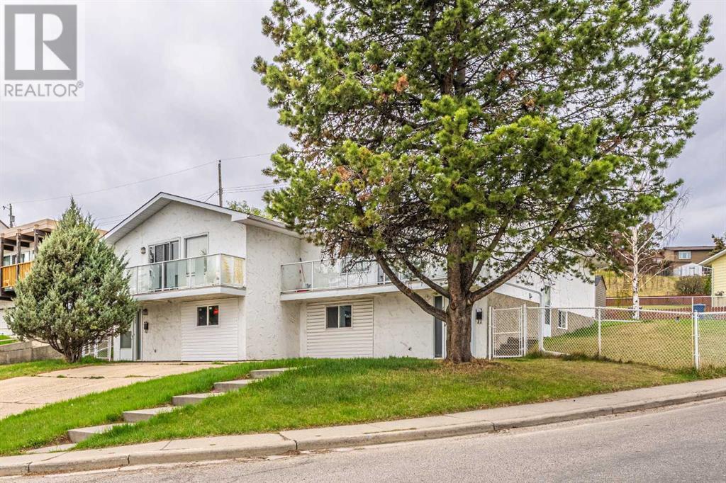 Multi-family House Bi-level for Sale in  Tavender Road NW Thorncliffe Calgary 