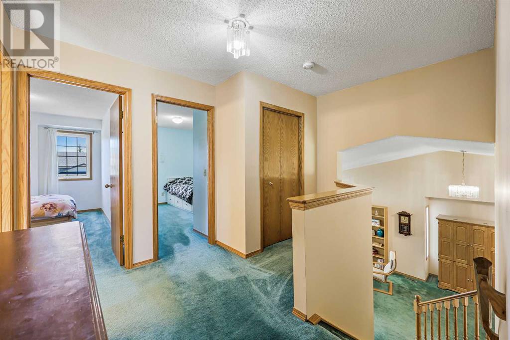 Single Family House for Sale in  Hawkmount Close NW Hawkwood Calgary 