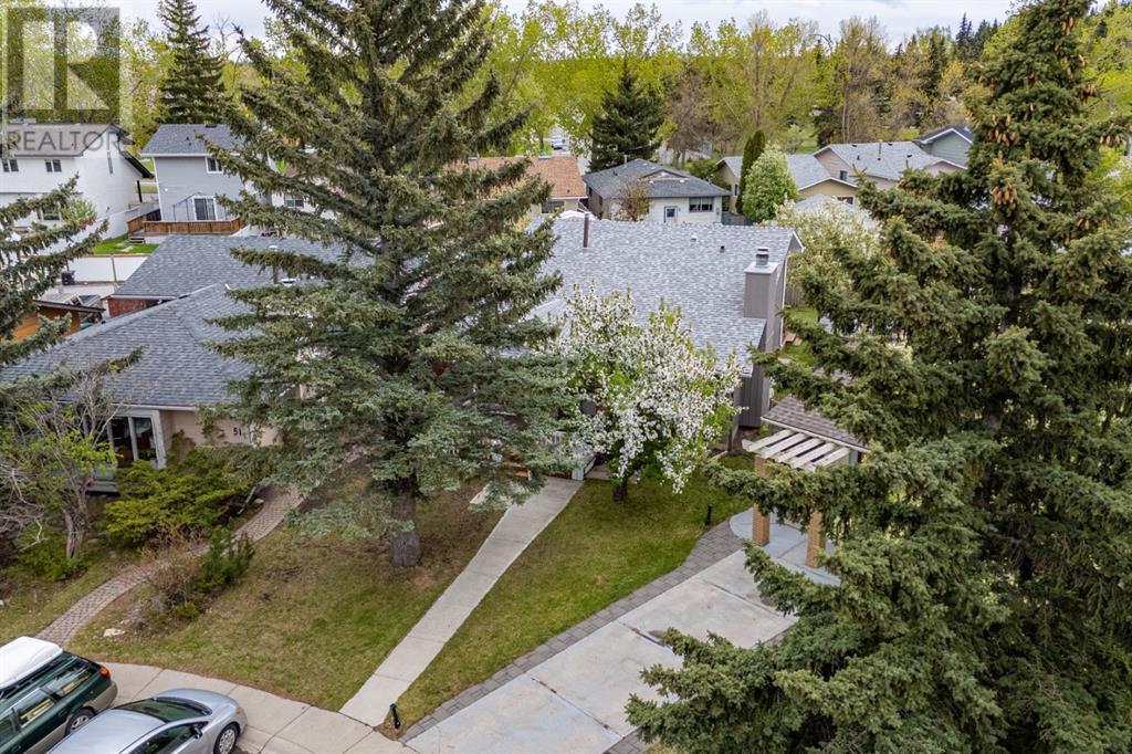 Single Family House 3 Level for Sale in  Sunbank Place SE Sundance Calgary 