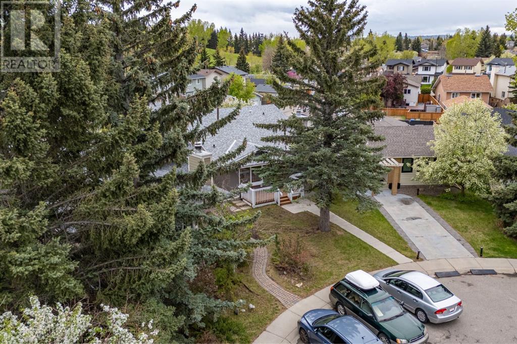 Single Family House 3 Level for Sale in  Sunbank Place SE Sundance Calgary 