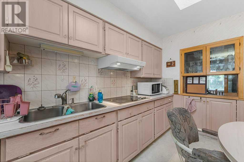 Single Family House Bungalow for Sale in  Fraser Road SE Fairview Calgary 