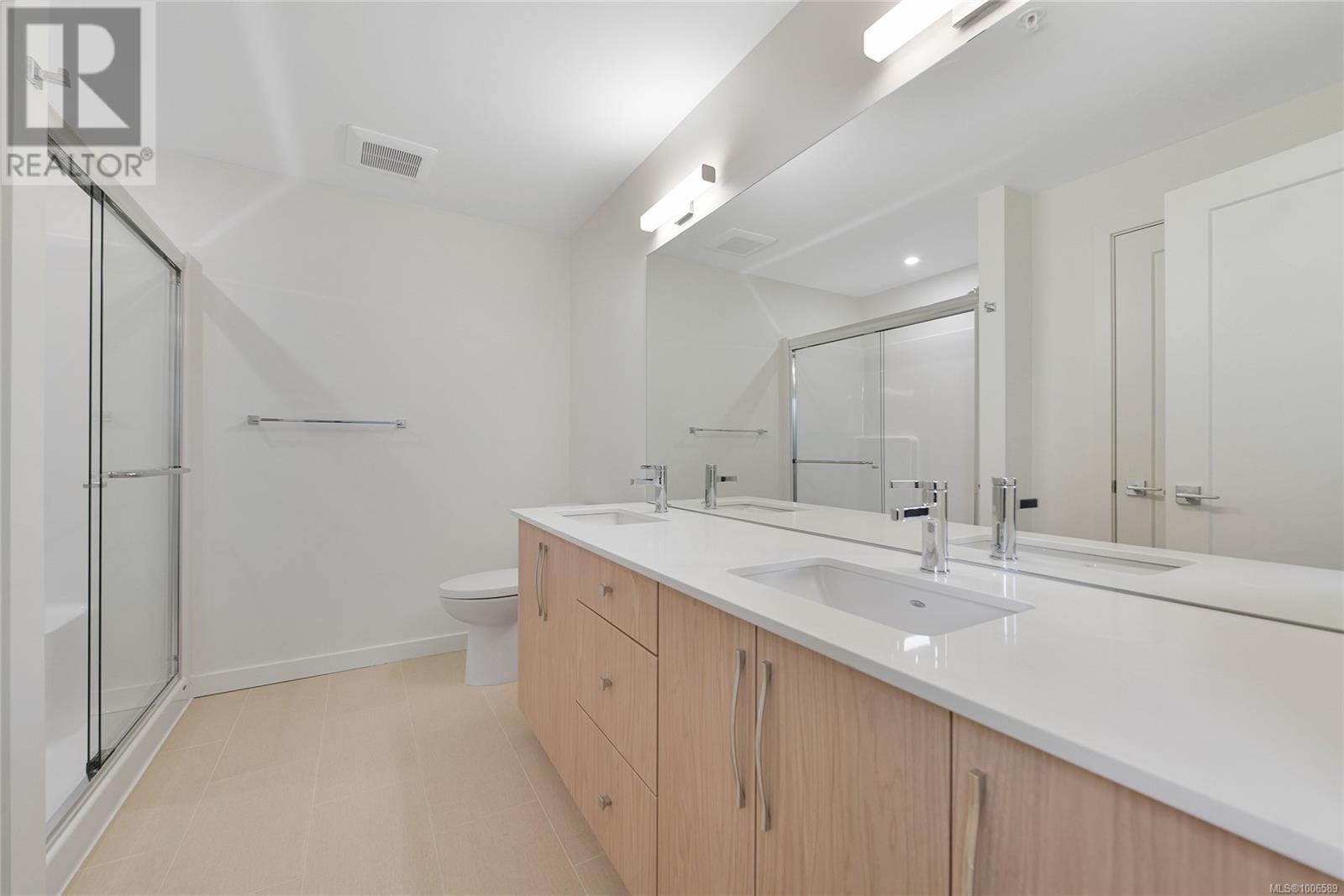 Photo 11 of 203 9716 Third St, Sidney BC