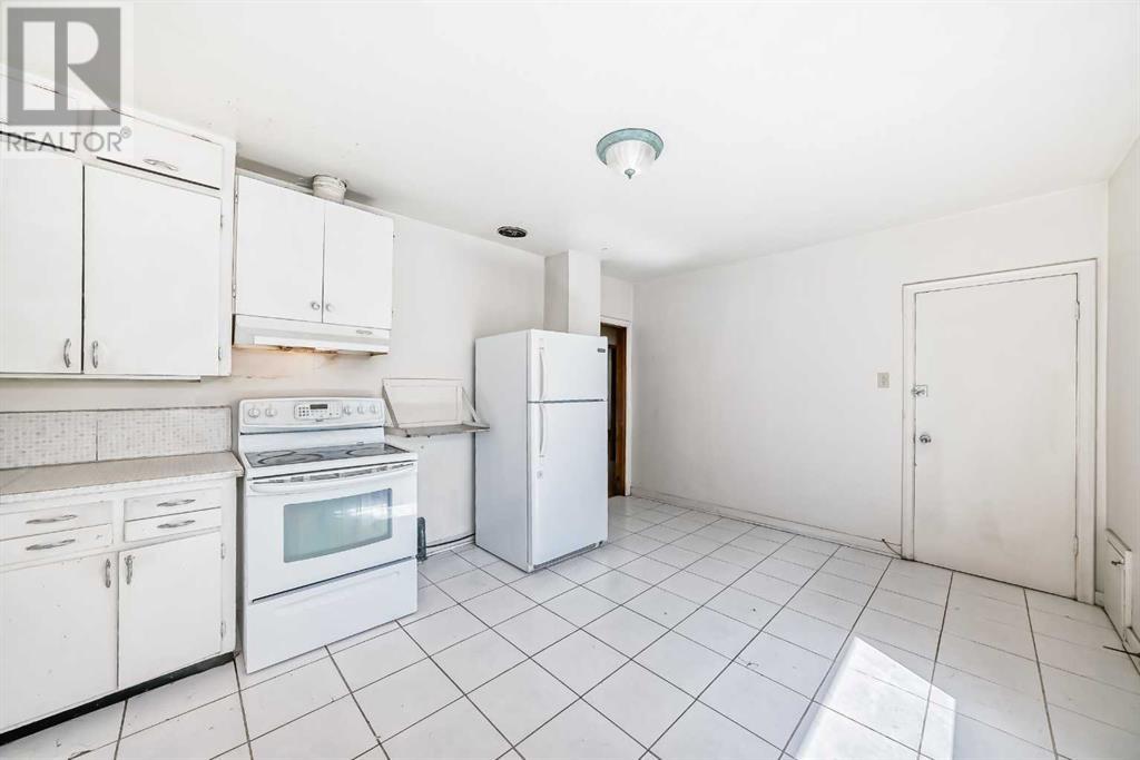 Single Family House Bungalow for Sale in  Centre Street NE Tuxedo Park Calgary 