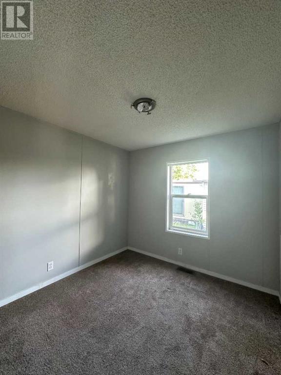 Single Family House Mobile Home for Sale in    Avenue SE Penbrooke Meadows Calgary 