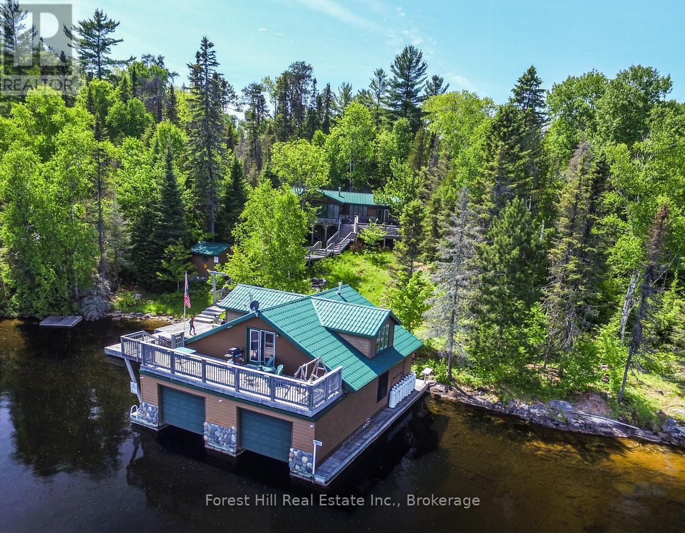 Aerial view with boathouse and suite
