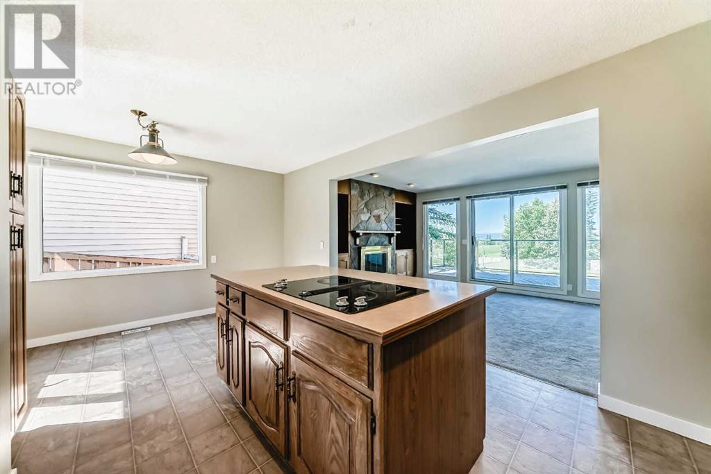 Single Family House 4 Level for Sale in  Hawksbrow Drive NW Hawkwood Calgary 