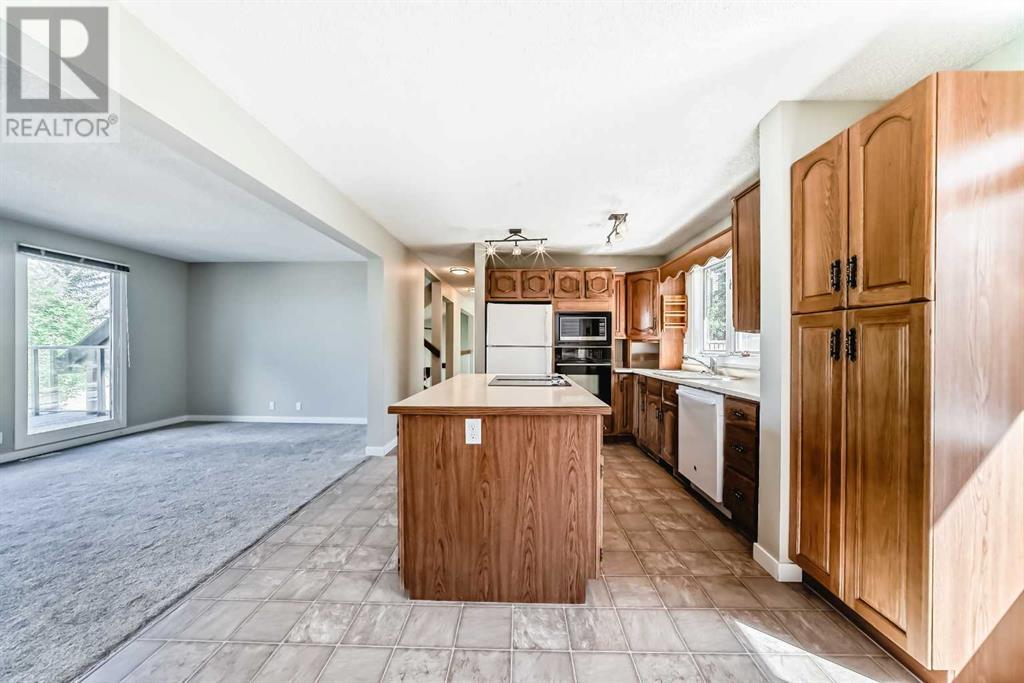 Single Family House 4 Level for Sale in  Hawksbrow Drive NW Hawkwood Calgary 