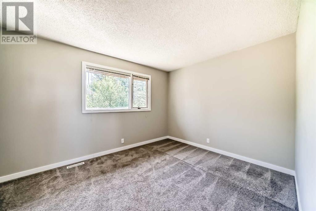 Single Family House 4 Level for Sale in  Hawksbrow Drive NW Hawkwood Calgary 