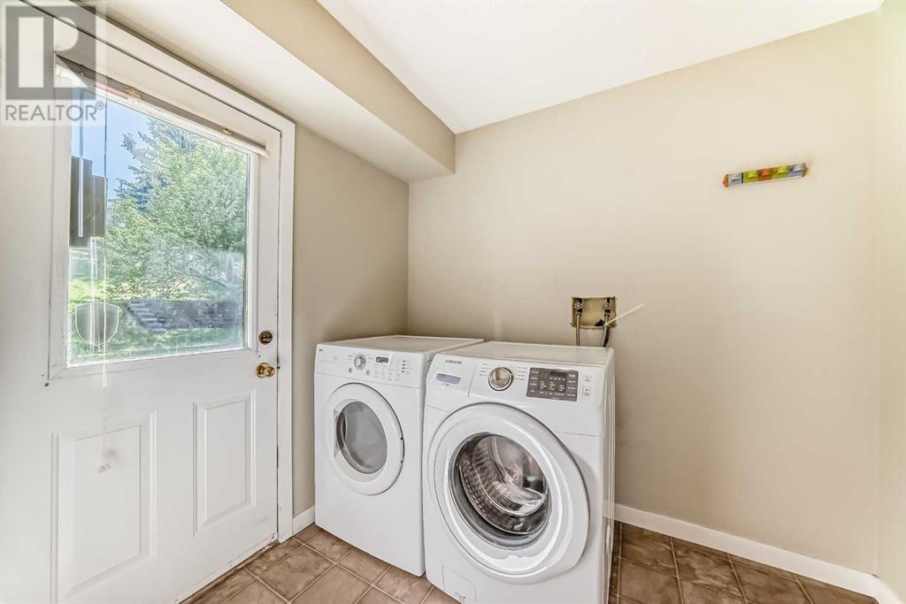 Single Family House 4 Level for Sale in  Hawksbrow Drive NW Hawkwood Calgary 