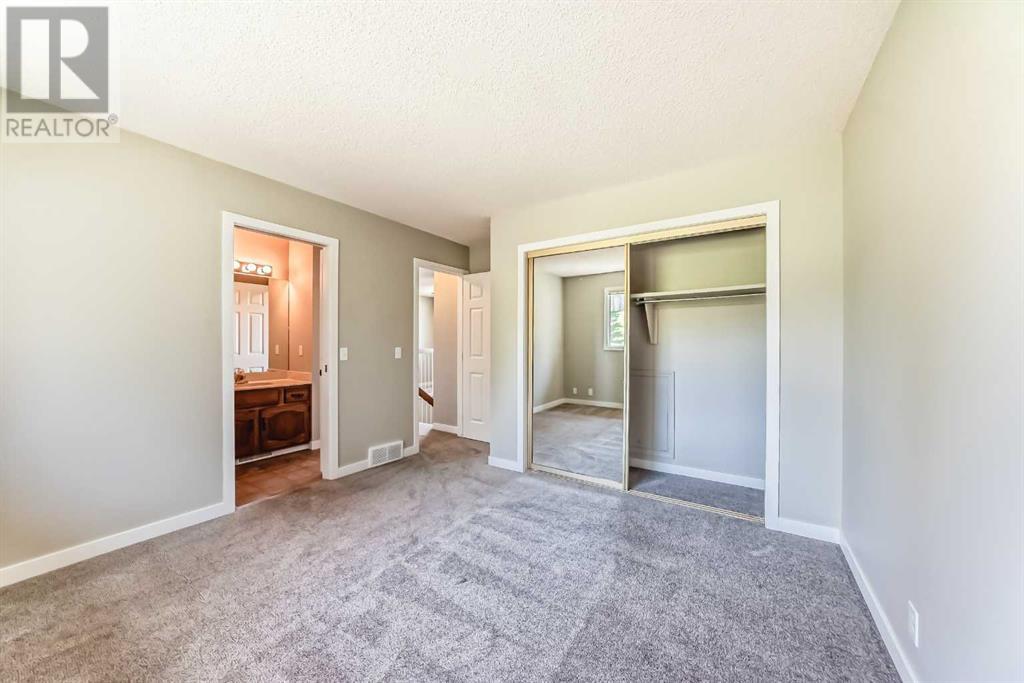 Single Family House 4 Level for Sale in  Hawksbrow Drive NW Hawkwood Calgary 