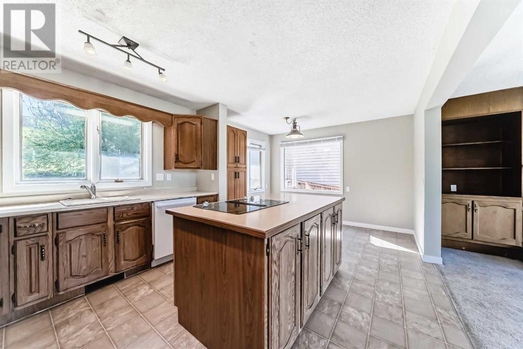 Single Family House 4 Level for Sale in  Hawksbrow Drive NW Hawkwood Calgary 