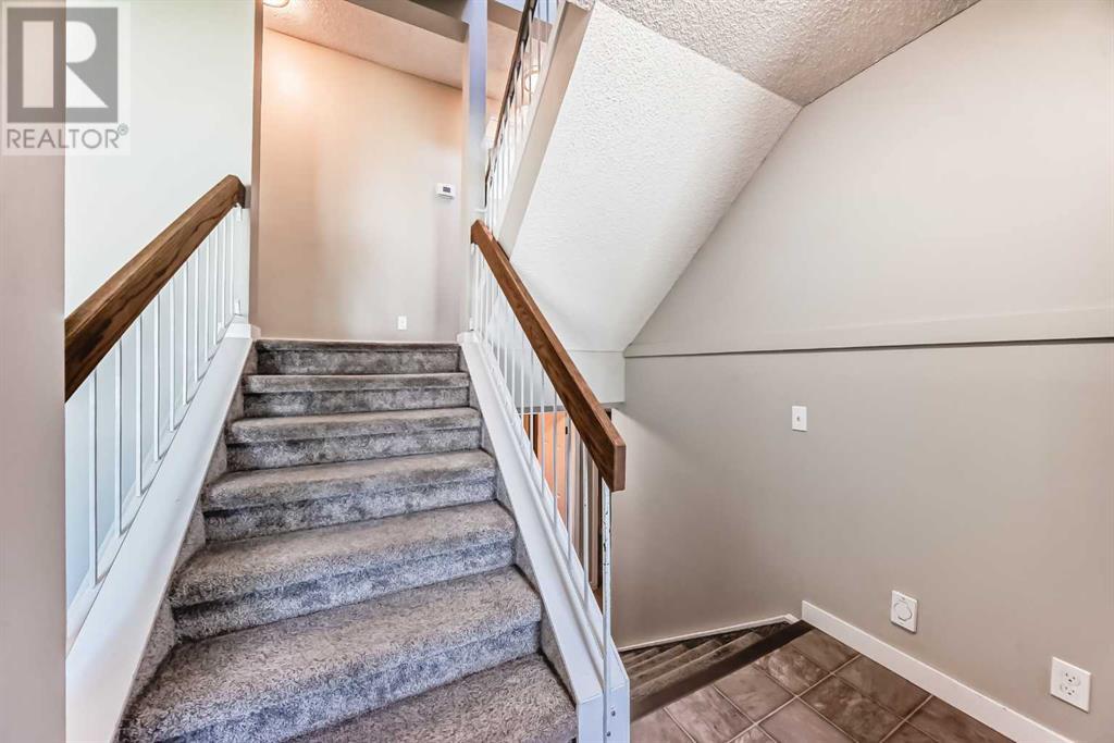 Single Family House 4 Level for Sale in  Hawksbrow Drive NW Hawkwood Calgary 