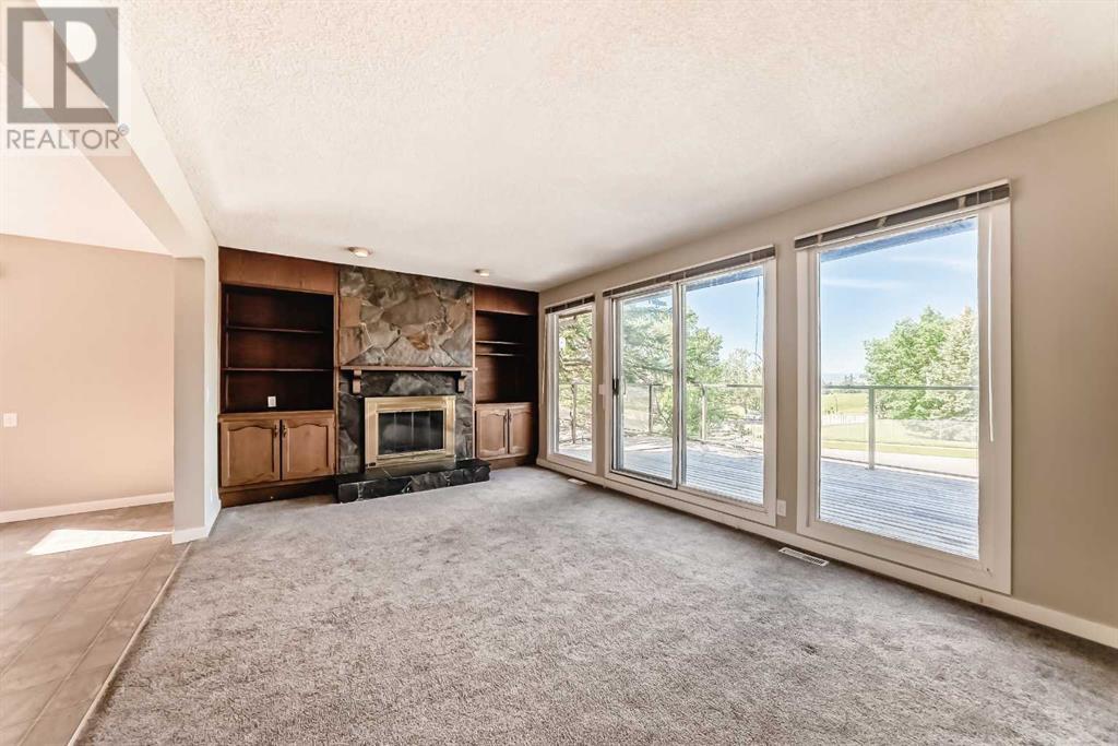 Single Family House 4 Level for Sale in  Hawksbrow Drive NW Hawkwood Calgary 