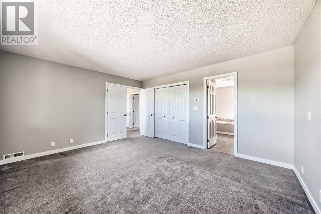 Single Family House 4 Level for Sale in  Hawksbrow Drive NW Hawkwood Calgary 