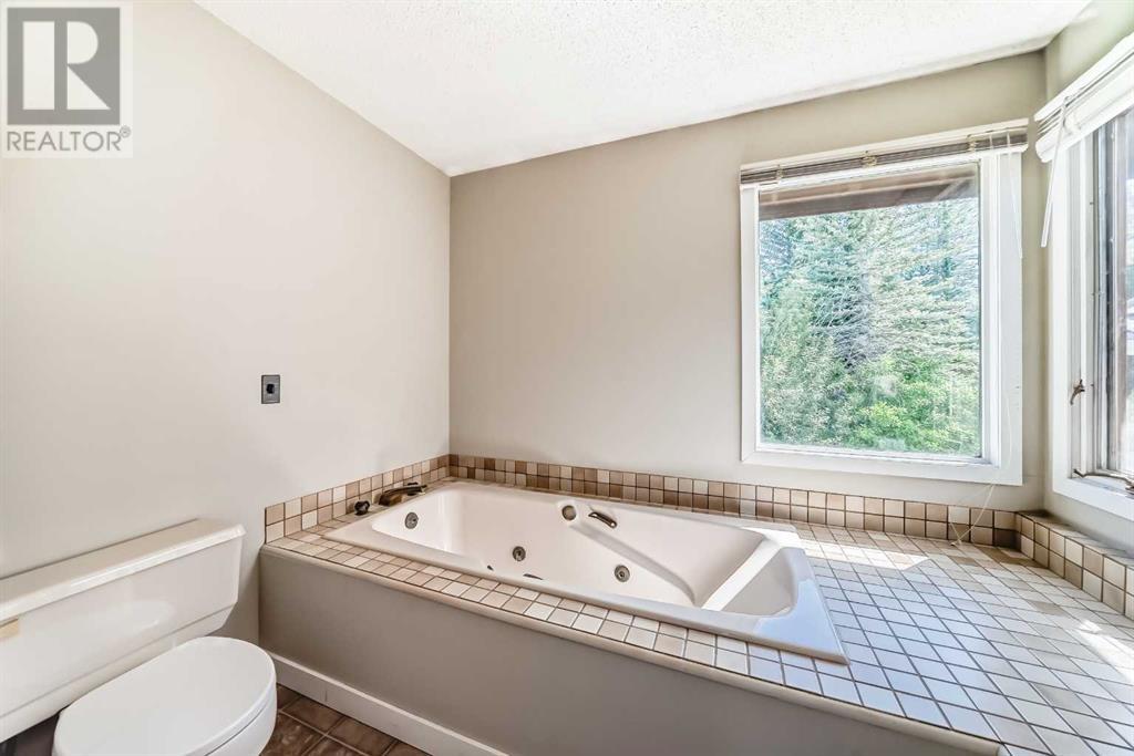 Single Family House 4 Level for Sale in  Hawksbrow Drive NW Hawkwood Calgary 