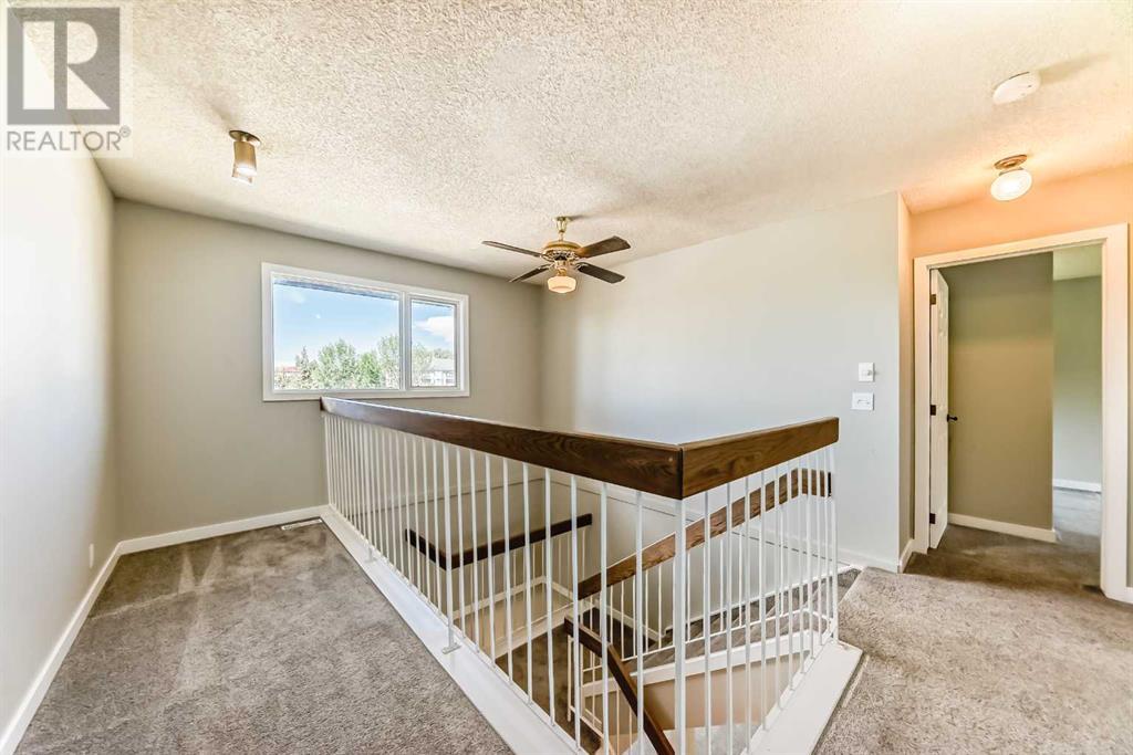 Single Family House 4 Level for Sale in  Hawksbrow Drive NW Hawkwood Calgary 