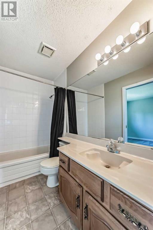 Single Family House 4 Level for Sale in  Hawksbrow Drive NW Hawkwood Calgary 