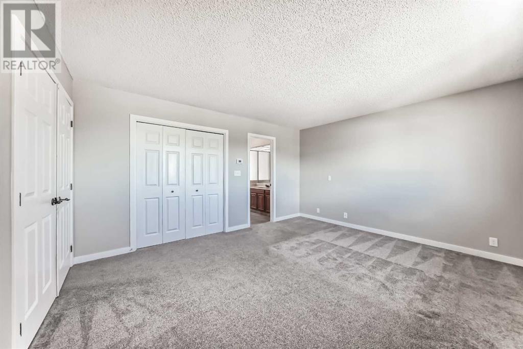 Single Family House 4 Level for Sale in  Hawksbrow Drive NW Hawkwood Calgary 