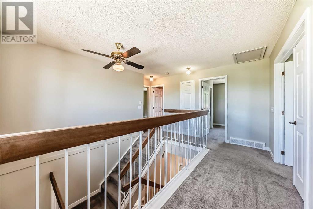 Single Family House 4 Level for Sale in  Hawksbrow Drive NW Hawkwood Calgary 