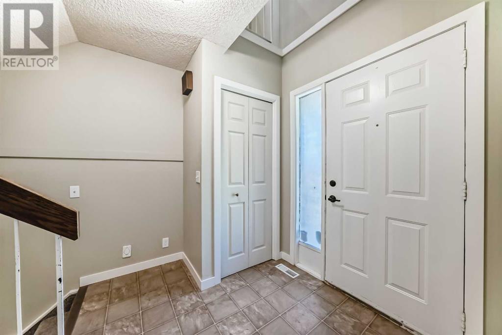 Single Family House 4 Level for Sale in  Hawksbrow Drive NW Hawkwood Calgary 