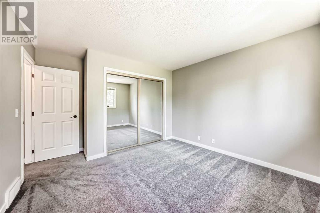 Single Family House 4 Level for Sale in  Hawksbrow Drive NW Hawkwood Calgary 