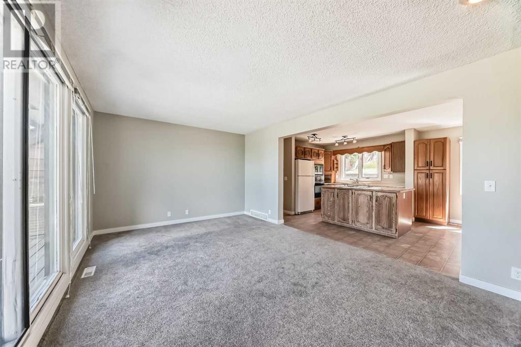 Single Family House 4 Level for Sale in  Hawksbrow Drive NW Hawkwood Calgary 