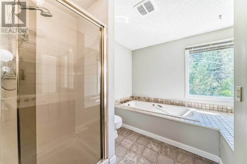 Single Family House 4 Level for Sale in  Hawksbrow Drive NW Hawkwood Calgary 