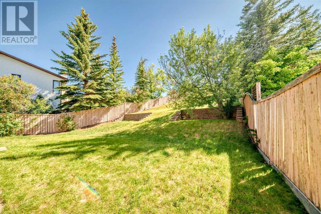 Single Family House 4 Level for Sale in  Hawksbrow Drive NW Hawkwood Calgary 