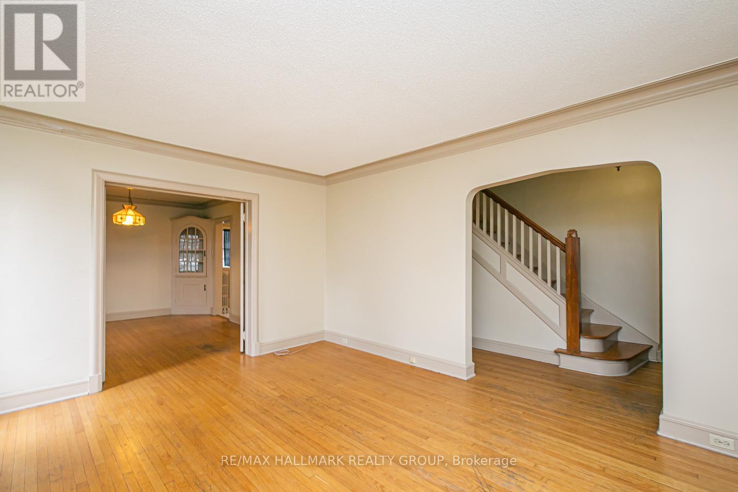 Living & dining room with view towards stairs