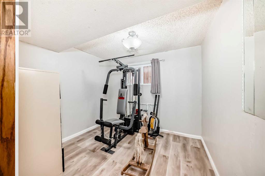 Single Family House Bi-level for Sale in  Shawcliffe Circle SW Shawnessy Calgary 